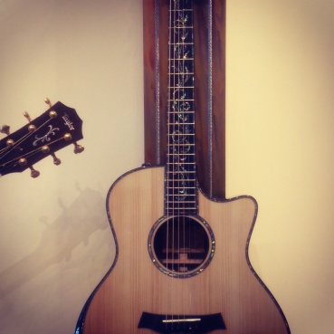 A beautiful acoustic guitar with inlays.