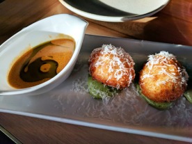 Arancini with red Thai coconut curry sauce